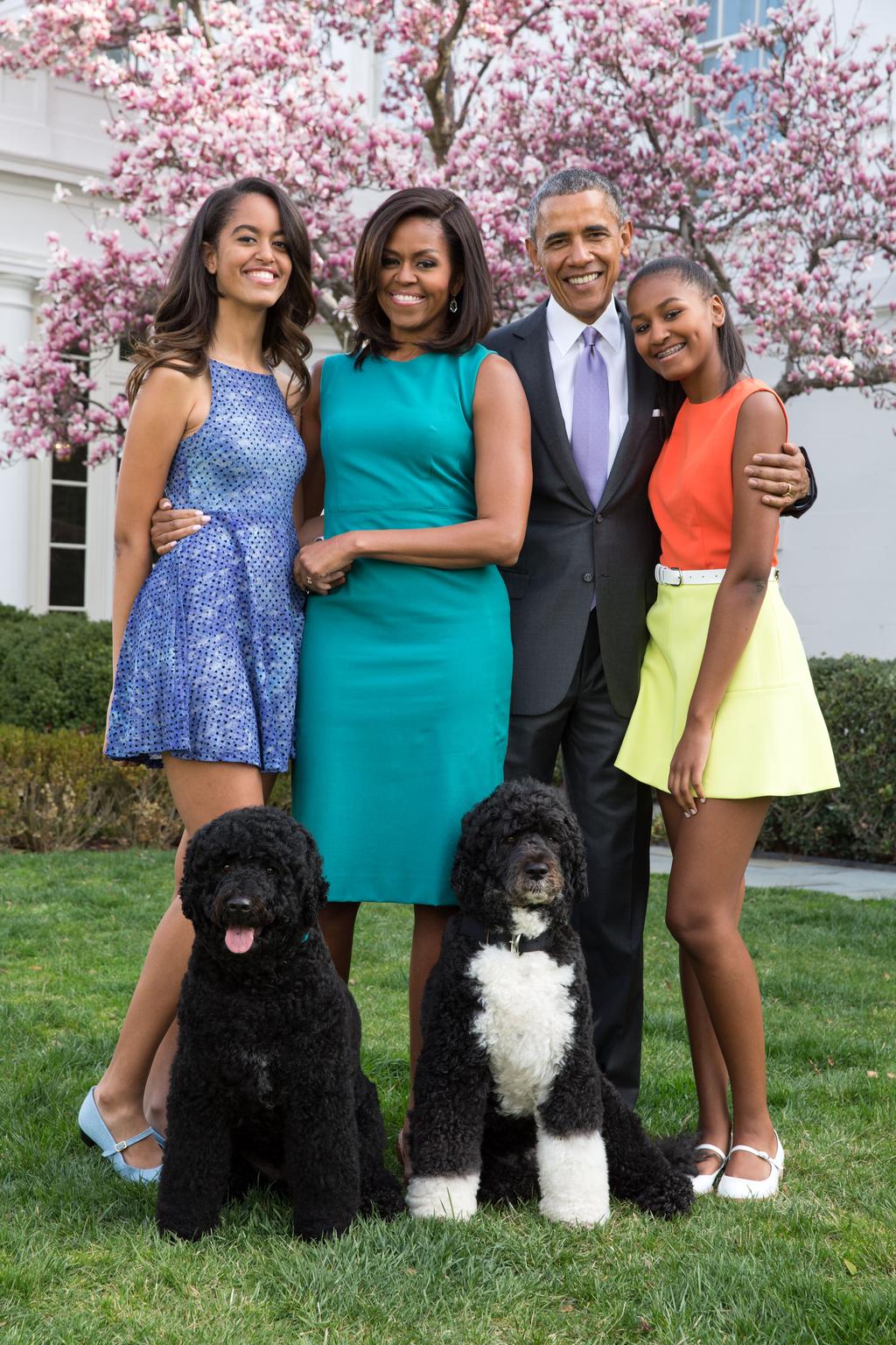 Former President Barack Obama, former First Lady Michelle Obama and daughters Malia and Sasha with pets Bo and Sunny