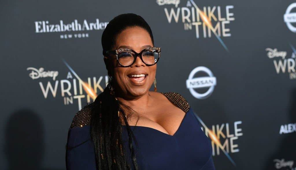 LOS ANGELES, CA - FEBRUARY 26: Oprah Winfrey attends the premiere of Disney's "A Wrinkle In Time" at the El Capitan Theatre on February 26, 2018 in Los Angeles, California. (Photo by Kevin Winter/Getty Images) thegrio.com