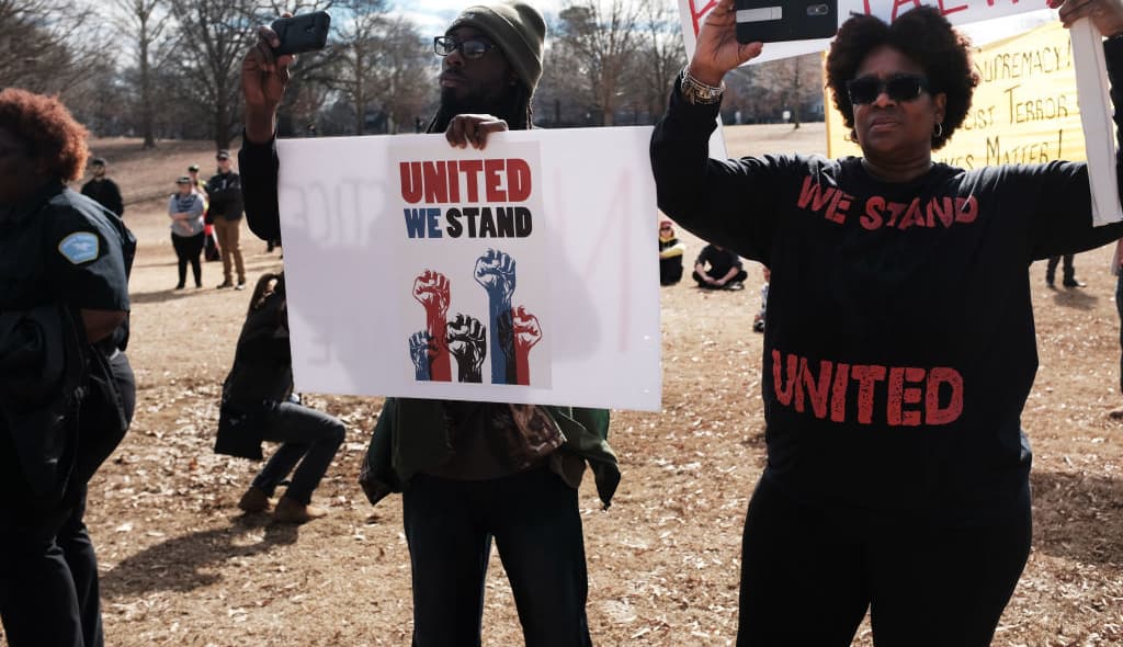ATLANTA, GEORGIA - FEBRUARY 02: People attend an afternoon rally against racism on February 02, 2019 in Atlanta, Georgia. Alt-right and white supremacist groups had planned to hold a rally at Stone Mountain, a park celebrating confederate history, but backed out after officials closed the park with a heavy police presence. Atlanta is hosting Super Bowl LII between the Los Angeles Rams and New England Patriots on Sunday. (Photo by Spencer Platt/Getty Images) thegrio.com