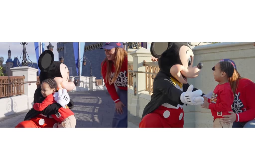 Mickey Mouse and a fan at Magic Kingdom