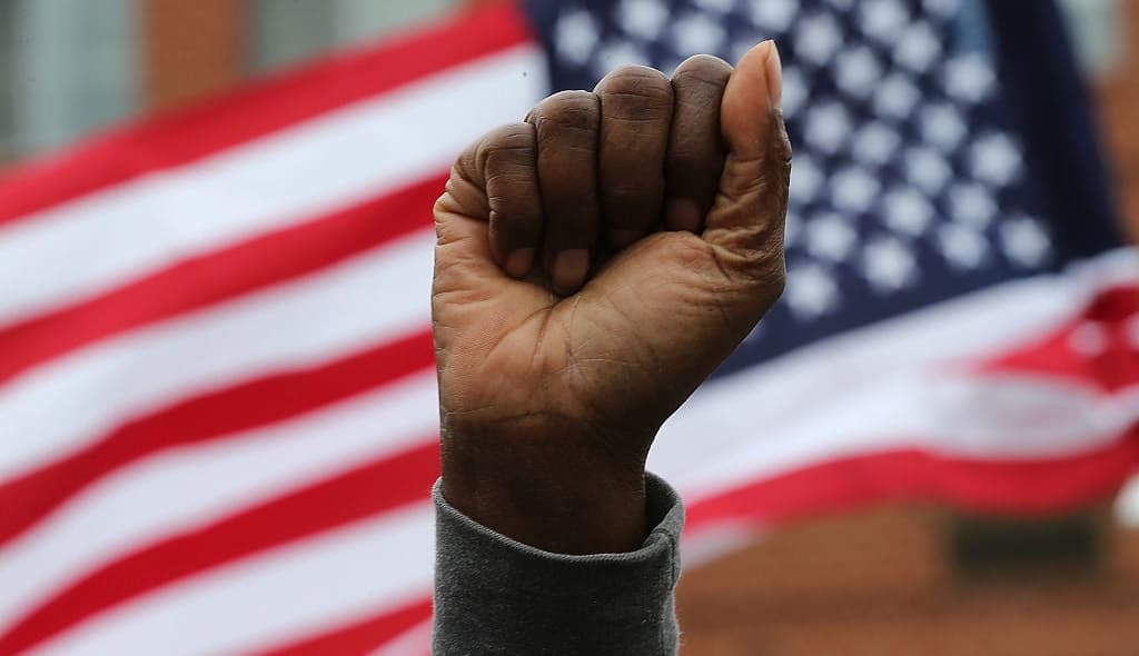 Black first, American flag, theGrio.com