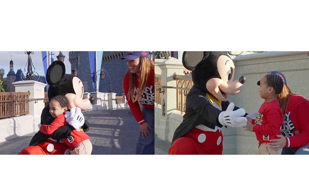 Mickey Mouse and a fan at Magic Kingdom