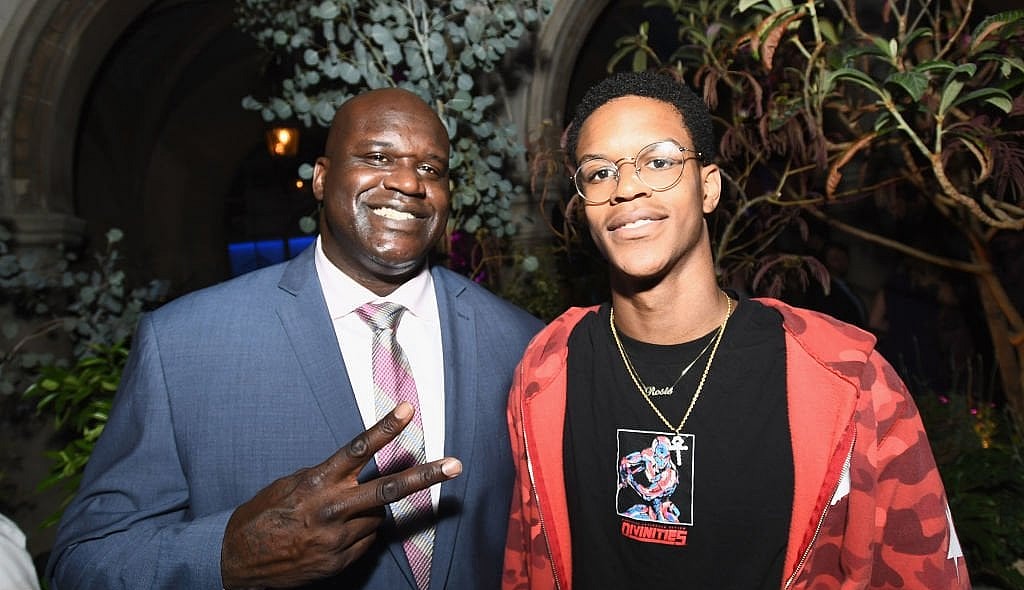 WEST HOLLYWOOD, CA - AUGUST 07: Former NBA player Shaquille O'Neal (L) and son Shareef O'Neal at Apple Music Launch Party Carpool Karaoke: The Series with James Corden on August 7, 2017 in West Hollywood, California. (Photo by Emma McIntyre/Getty Images for Apple) thegrio.com