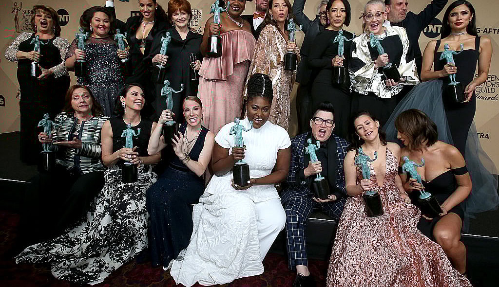The cast of 'Orange Is The New Black' pose in the press room with their award for Outstanding Performance by an Ensemble in a Comedy Series at the 23rd Annual Screen Actors Guild Awards at The Shrine Expo Hall on January 29, 2017 in Los Angeles, California. (Photo by Dan MacMedan/WireImage)