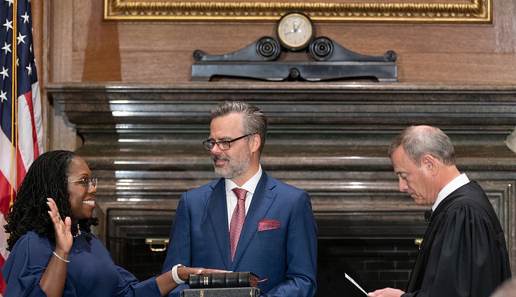Chief Justice John G. Roberts, Jr., right, administers the Constitutional Oath to Judge Ketanji Brown Jackson