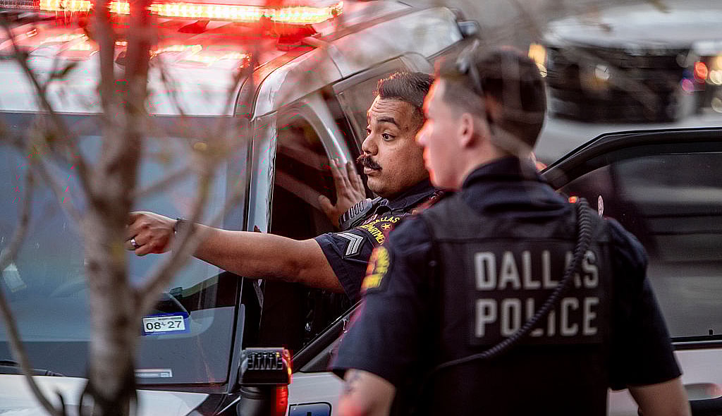 Jasmine Crockett, Dallas police shooting, Mike King Dallas standoff, Crockett security detail incident, Dallas SWAT shooting hospital garage, off-duty police security, Texas, thegrio.com
