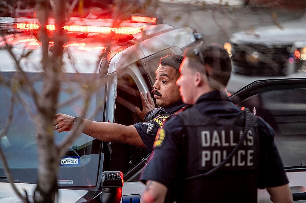 Jasmine Crockett, Dallas police shooting, Mike King Dallas standoff, Crockett security detail incident, Dallas SWAT shooting hospital garage, off-duty police security, Texas, thegrio.com