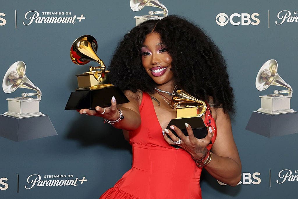 SZA, AI music, artificial intelligence, Warner Bros. Discovery, Amazon Web Services, Black music, R&B, music industry, technology, entertainment, thegrio.com
