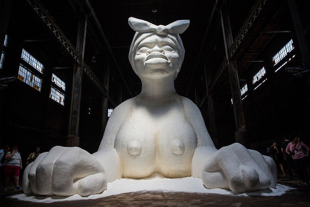Large Scale Sugar-Coated Sculpture Displayed In Brooklyn's Former Domino Sugar Refinery