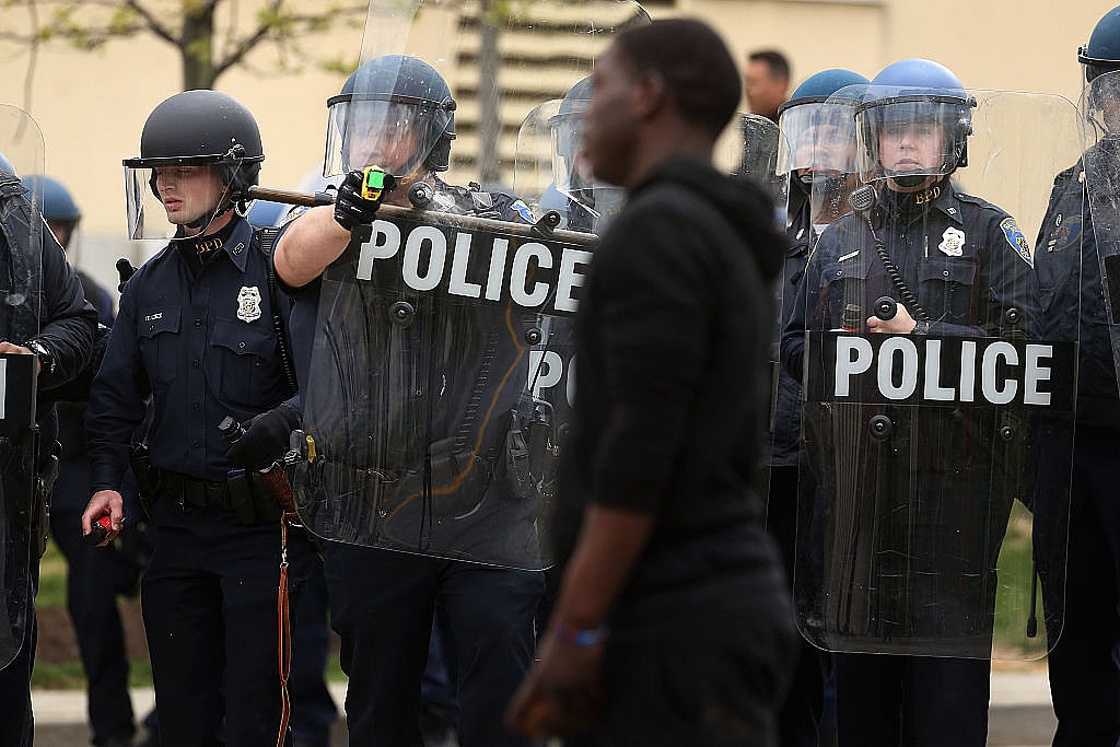 Baltimore police officers, theGrio.com