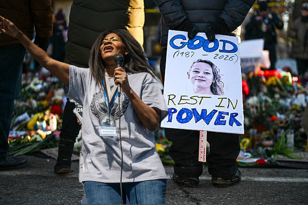The aunt of George Floyd, Angela Harrelson, mourners of Renee Good