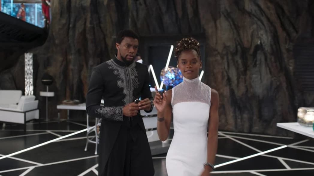 Chadwick Boseman and Letitia Wright in Black Panther thegrio.com