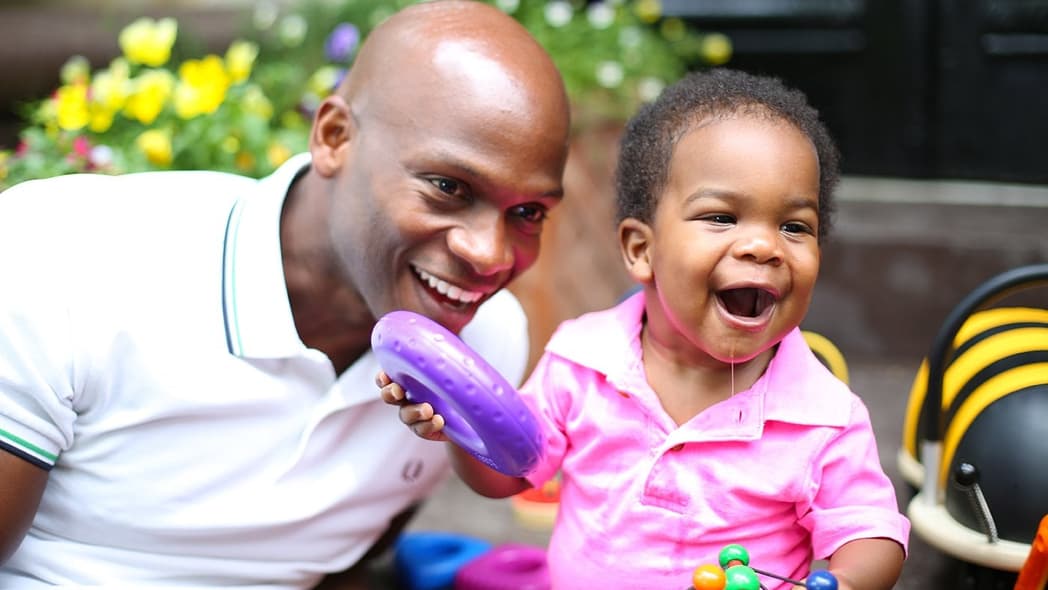 Father with drooling baby