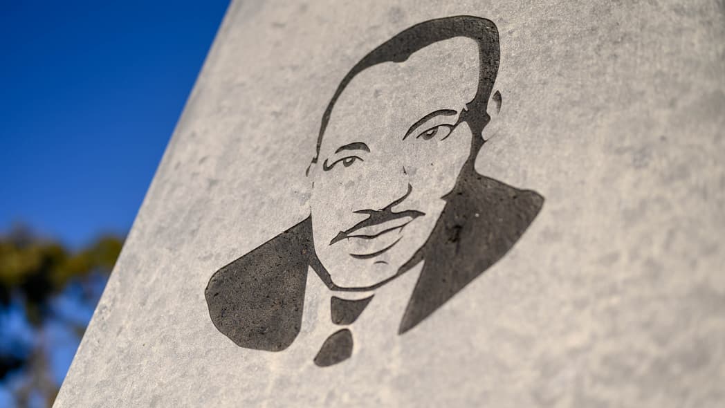 A stylized image of Martin Luther King Jr. on the obelisk at the Dr. Martin Luther King, Jr. Memorial Tree Grove