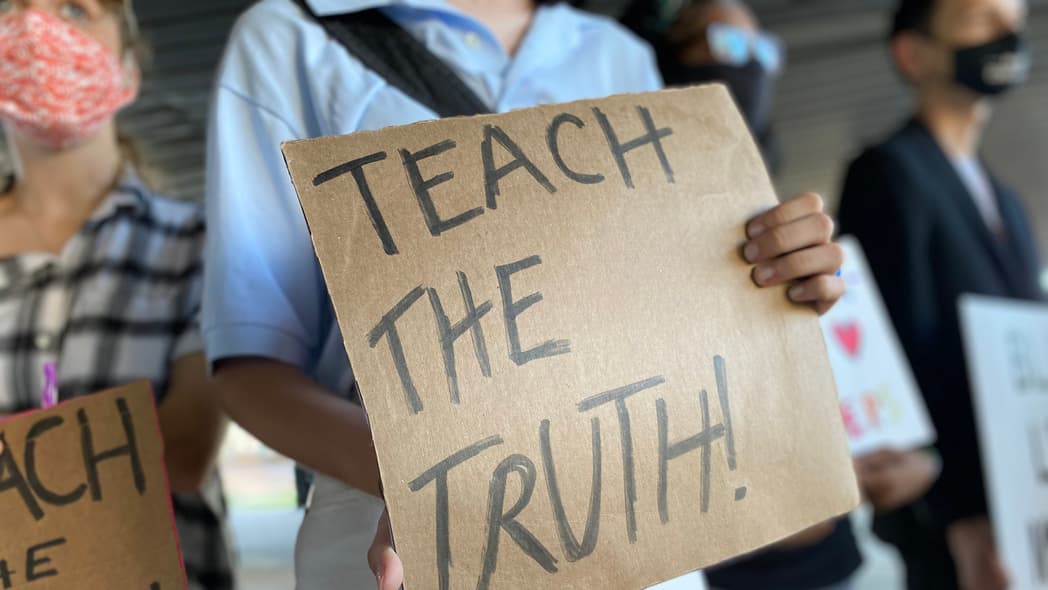 Students and community members gather for an education protest