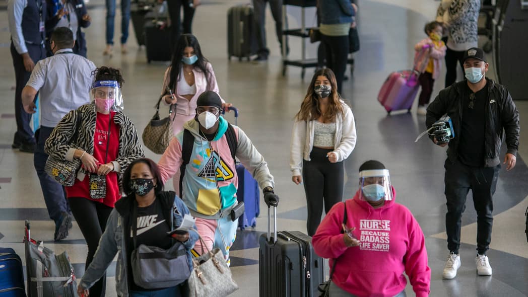 Holiday travelers at airport