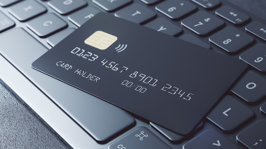 A credit card on a keyboard