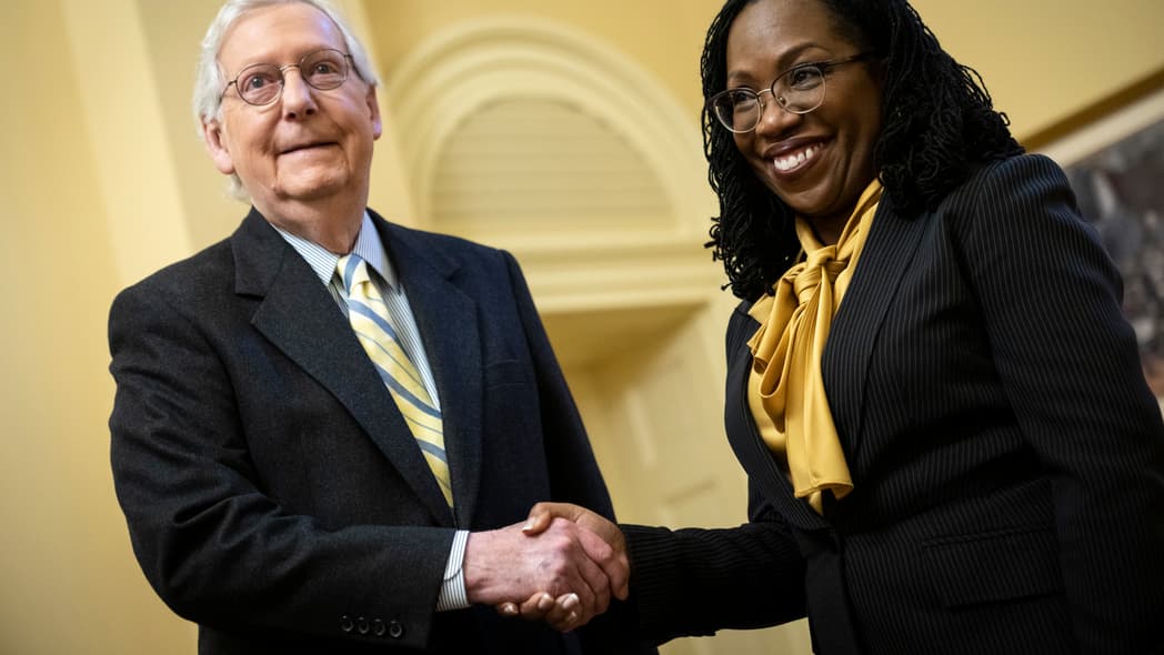 Senate Minority Leader Mitch McConnell (R-Ky.) shakes hands with Supreme Court Nominee Judge Ketanji Brown Jackson