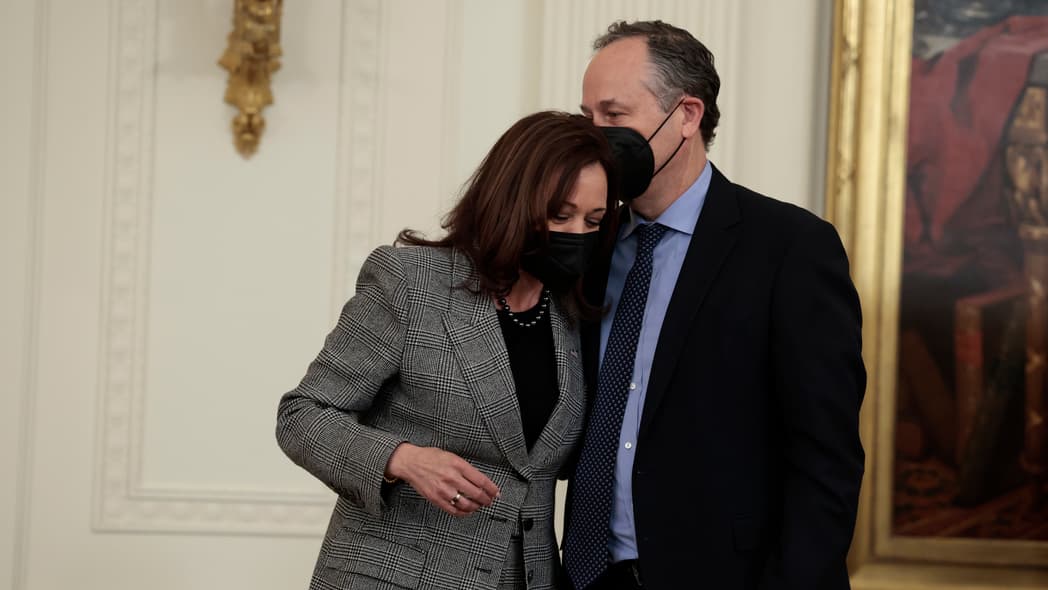 Second Gentleman Douglas Emhoff kisses his wife, Vice President Kamala Harris