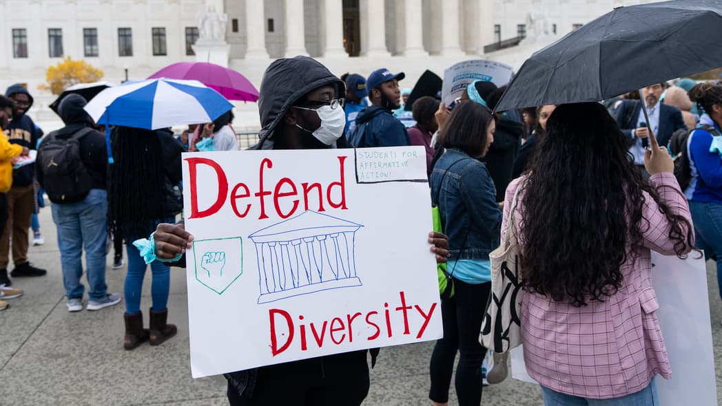 Protesters gather in front of the U.S. Supreme Court