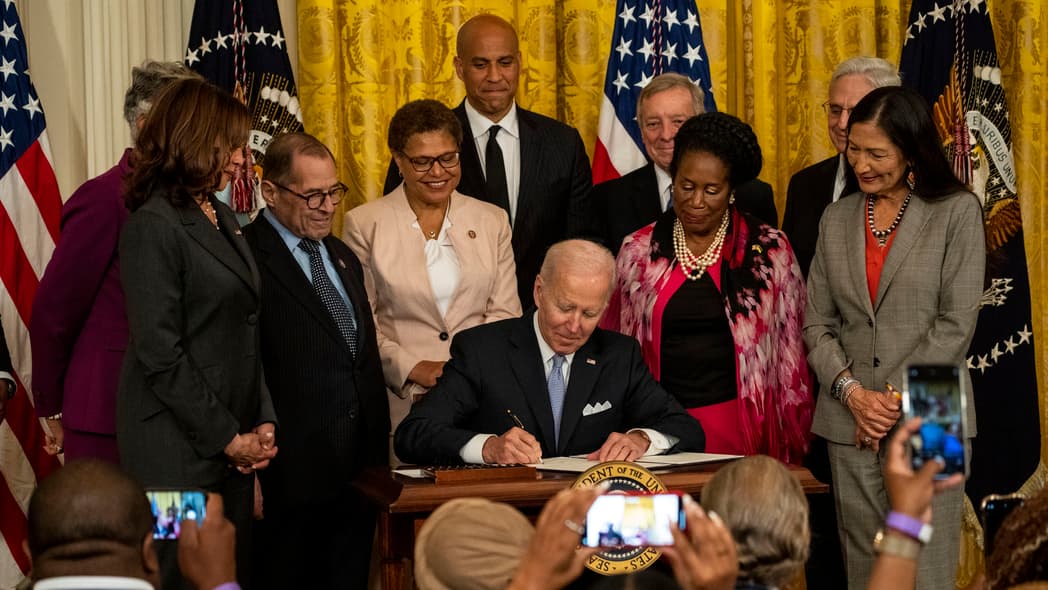 President Joe Biden signs an executive order