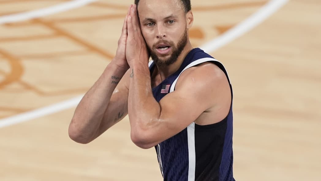 United States’ Stephen Curry (4) reacts after a three-point basket against France in the men’s gold medal basketball game at the 2024 Summer Olympics, Saturday, Aug. 10, 2024 in Paris, France. (AP Photo/Michael Conroy) theGrio.com