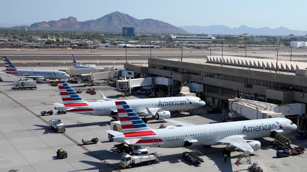 holiday travel, american airlines, thegrio.com