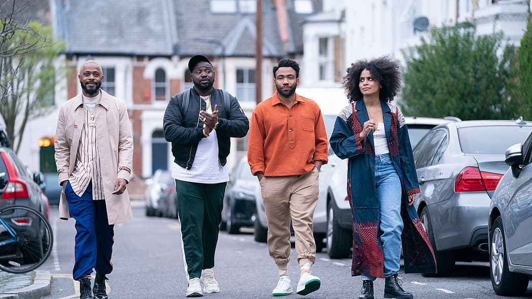 Actors LaKeith Stanfield, Brian Tyree Henry, Donald Glover and Zazie Beetz wearing casual outdoor clothing