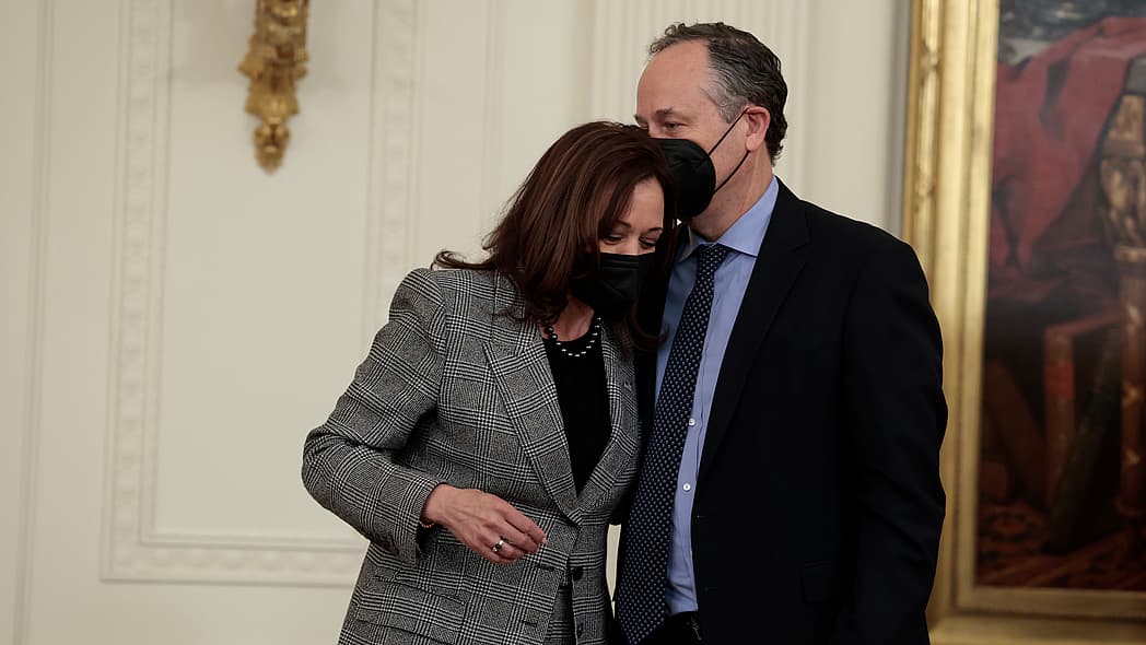 Second Gentleman Douglas Emhoff kisses his wife, Vice President Kamala Harris