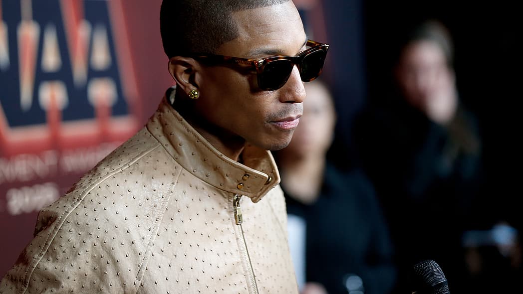 Pharrell Williams politcs, Pharrell Williams DEI, Pharrell Williams speech, Pharrell Williams Shoe of the Year award theGrio.com
