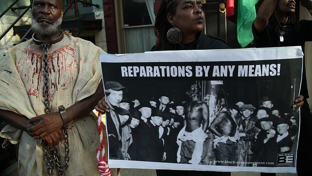 Activist Groups Protest Against Senate Majority Leader McConnell On National Reparations Day