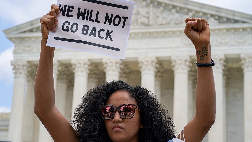 Scotney Young protests outside the U.S. Supreme Court