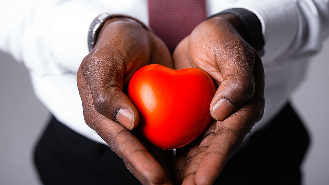 Hands holding a heart-shaped object