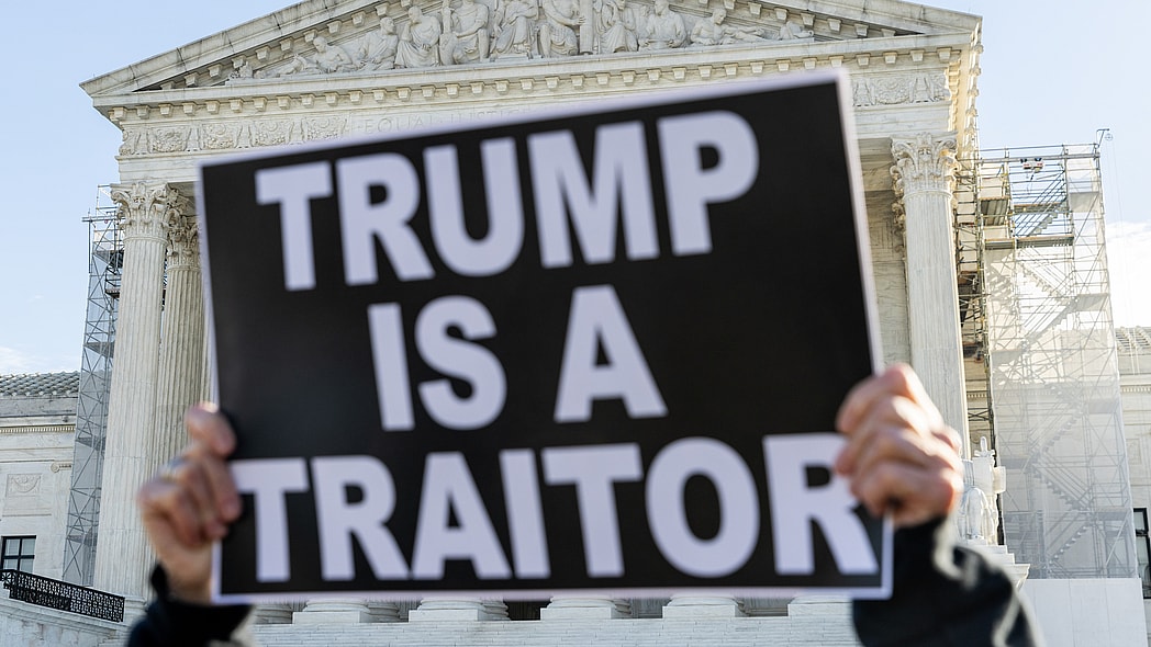 Protesters demonstrate outside of the U.S. Supreme Court