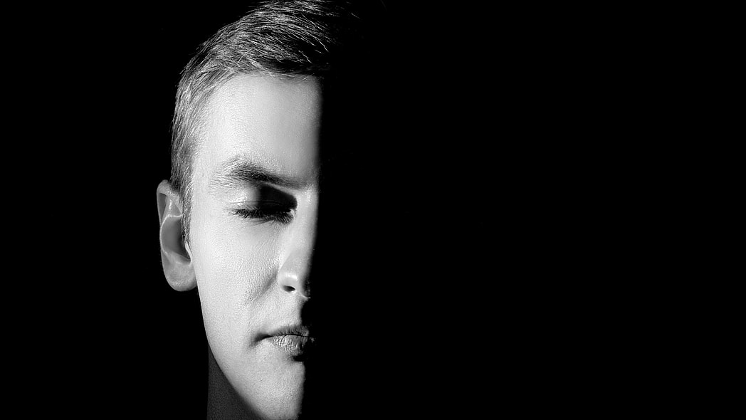 A face half in shadow