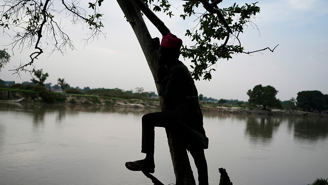 Man stands on the banks of the Yobe river in Nigeria