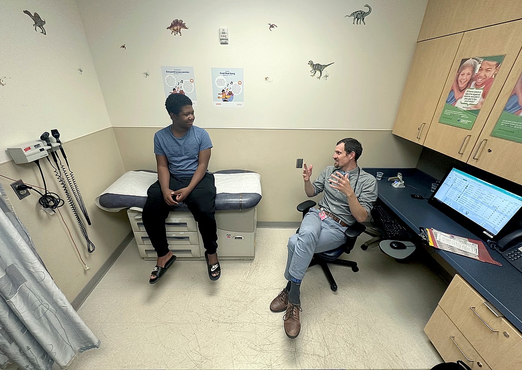 Black child, doctor, vaccines, theGrio.com