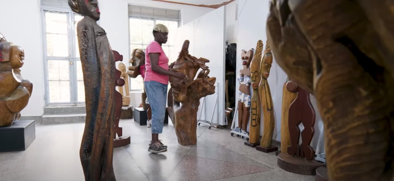 Lilian Nabulime with some of her work