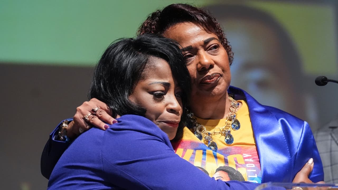 Angela Farris Watkins embraces her cousin Bernice King, daughter of civil rights leader Martin Luther King Jr.