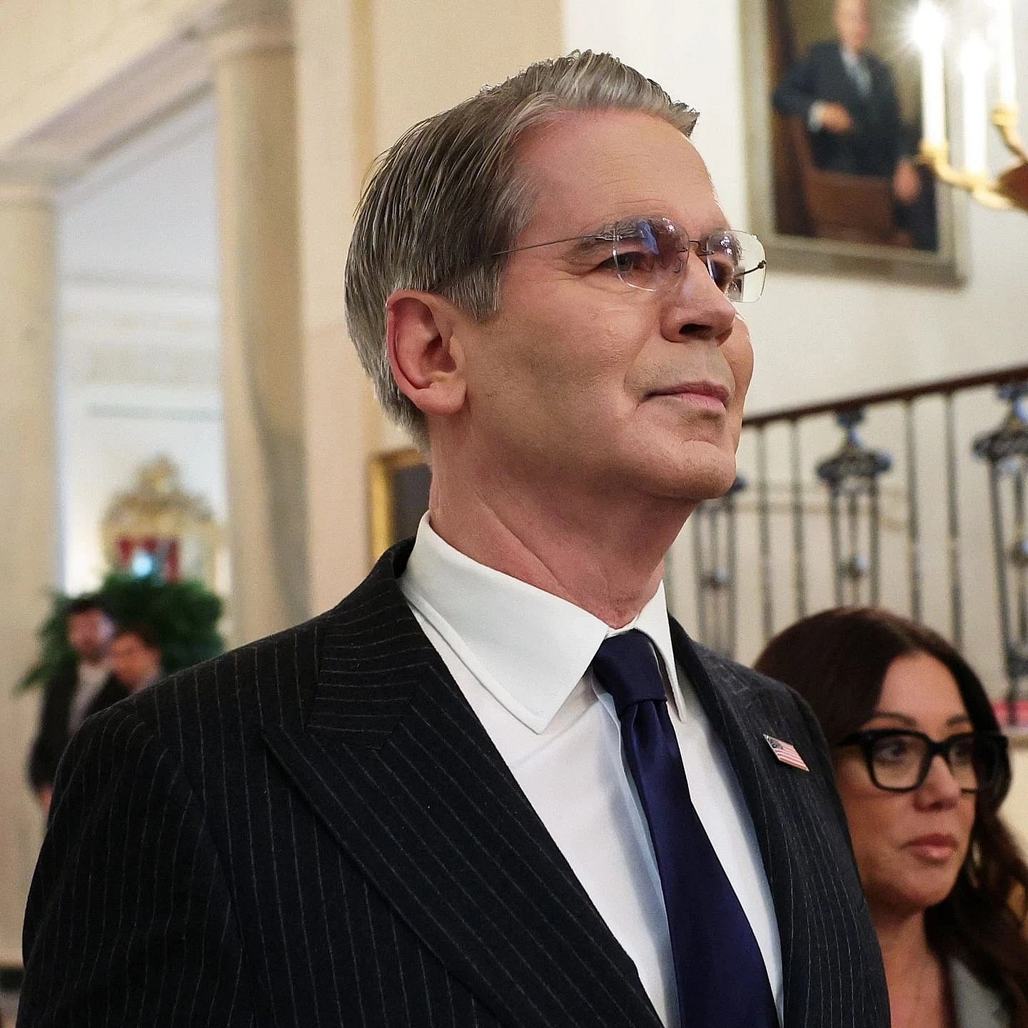 WASHINGTON, DC - MARCH 05: U.S. Treasury Secretary Scott Bessent looks on before an event celebrating 2025 MLS Cup Champions Inter Miami CF in the East Room of the White House on March 05, 2026 in Washington, DC. Inter Miami defeated the Vancouver Whitecaps 3-1 to win their first MLS Cup championship. (Photo by Win McNamee/Getty Images) thegrio.com