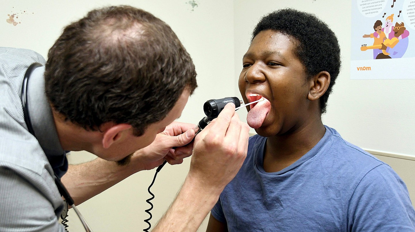 Black child, doctor, vaccines, theGrio.com