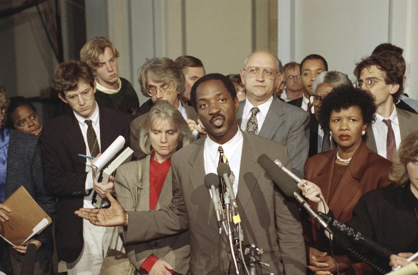 Charles Ogletree, lawyer for Anita Hill, speaks to reporters