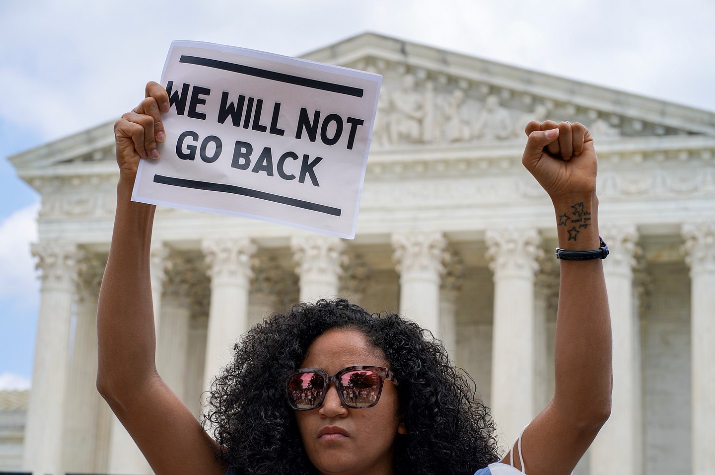 Scotney Young protests outside the U.S. Supreme Court