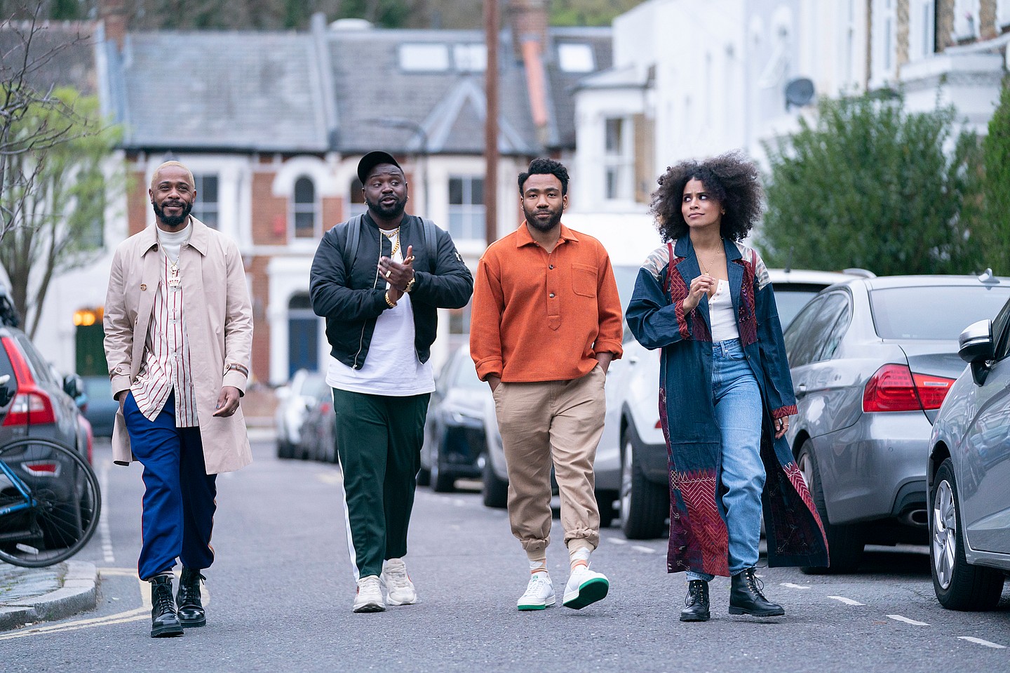 Actors LaKeith Stanfield, Brian Tyree Henry, Donald Glover and Zazie Beetz wearing casual outdoor clothing