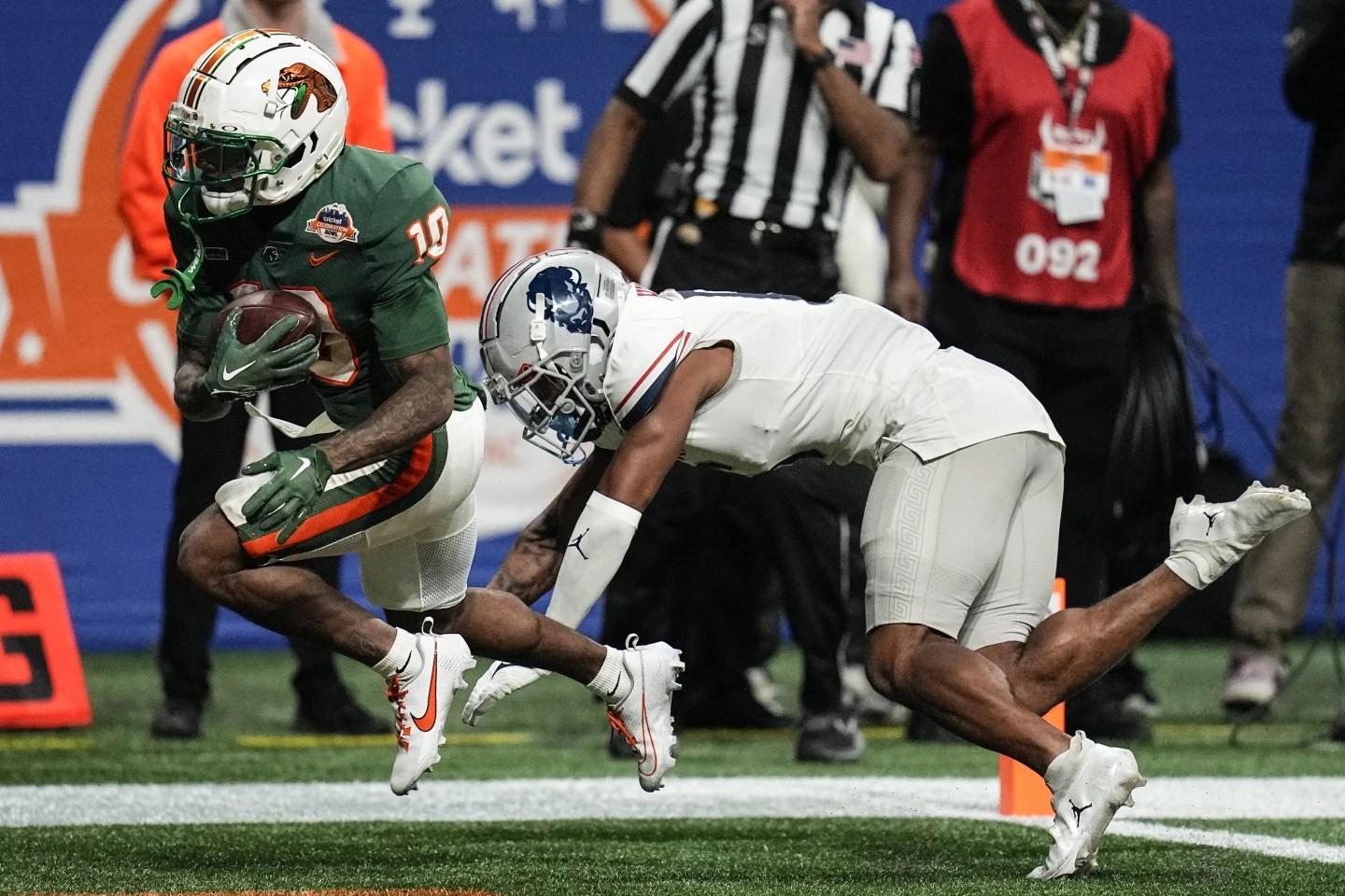Florida A&M wide receiver Jah’Marae Sheread scores a touchdown against Howard defensive back Carson Hinton