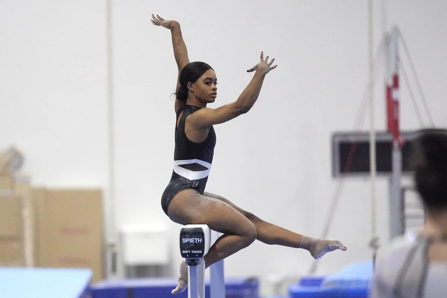 Gymnast Gabby Douglas competes on the balance beam