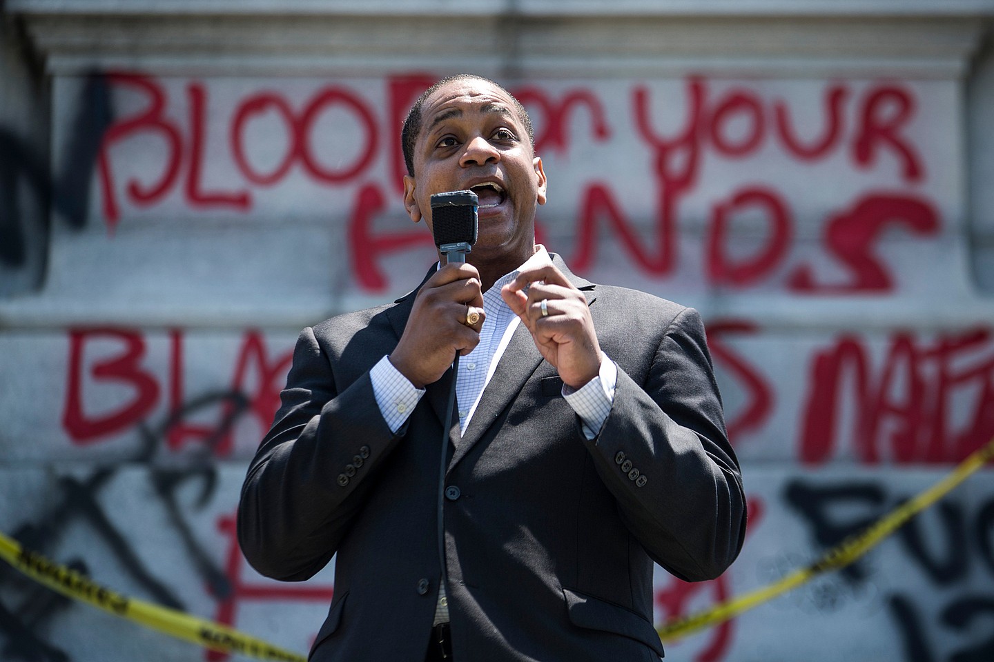 Virginia Lieutenant Gov. Justin Fairfax speaks to demonstrators in front of a statue of Confederate General Robert E. Lee is pictured on June 4, 2020 in Richmond, Virginia.(Photo by Zach Gibson/Getty Images) theGrio.com