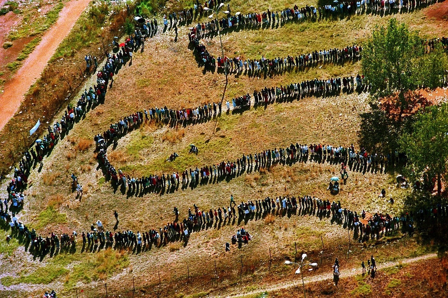 People line up to cast their votes In Soweto, South Africa