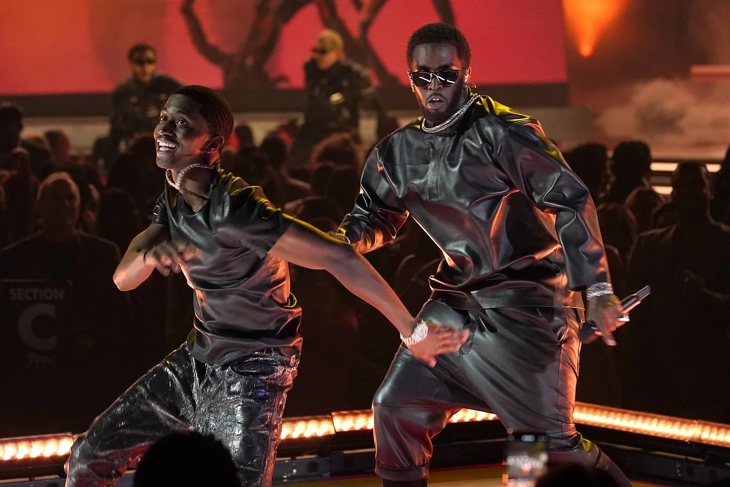Christian "King" Combs and Sean “Diddy” Combs perform