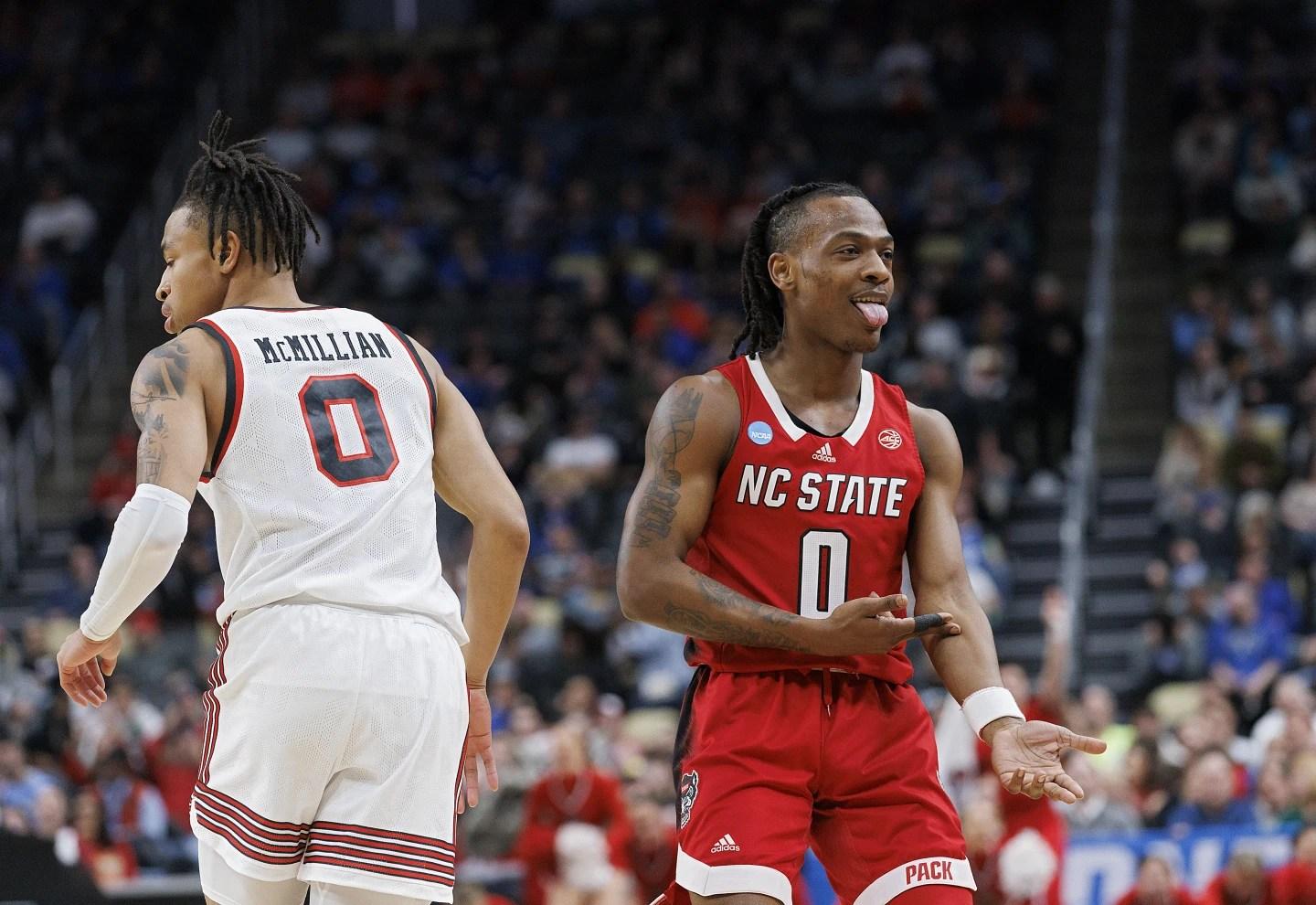 N.C. State’s DJ Horne, right